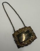 A Victorian silver wine label for 'Brandy'.