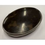A silver and faux tortoiseshell snuff box.