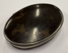A silver and faux tortoiseshell snuff box.