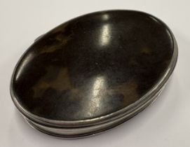 A silver and faux tortoiseshell snuff box.
