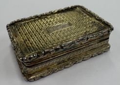 A William IV silver-gilt vinaigrette.