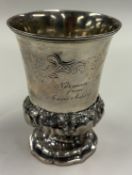 An 18th Century silver beaker.