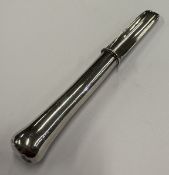 A 19th Century silver apple corer.