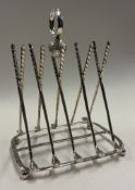 A rare silver toast rack.