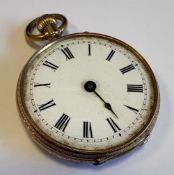 A 14 carat gold fob watch.