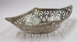 CHESTER: A silver pin dish.