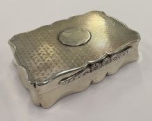 CHESTER: An engine-turned silver snuff box.