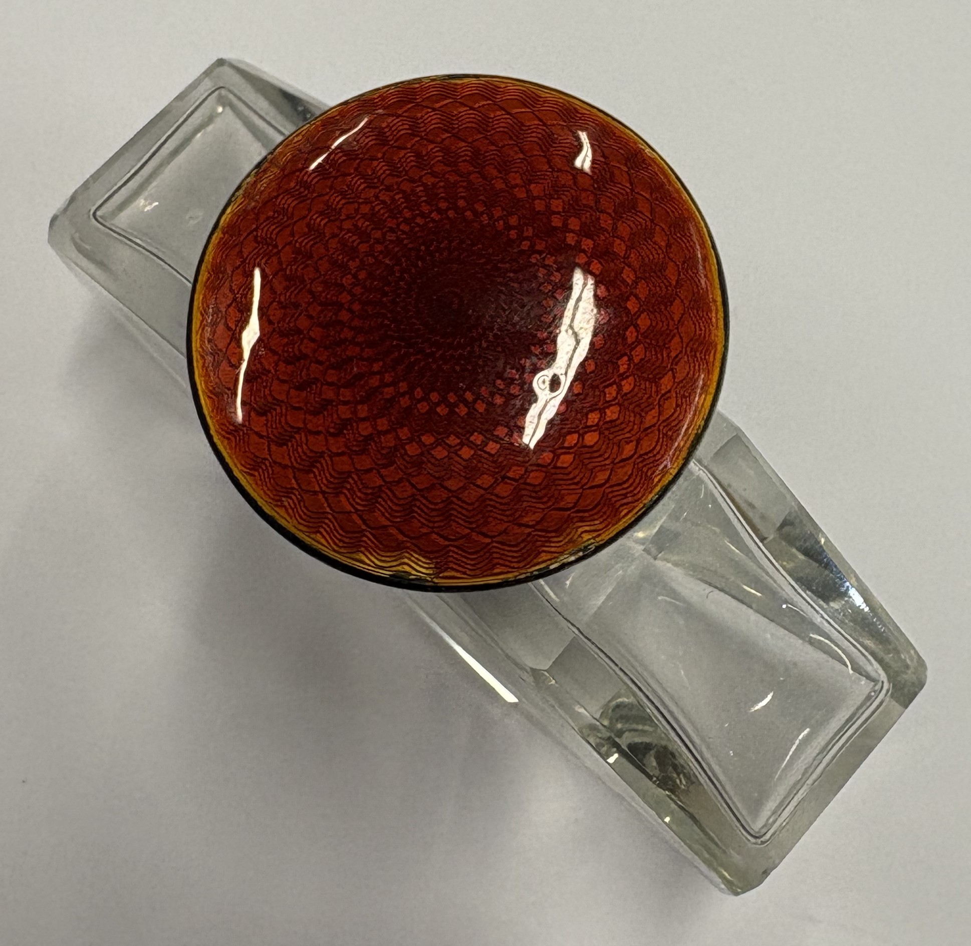 An early 20th Century silver and red enamelled glass scent bottle. - Image 3 of 3