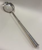 A rare 17th/18th Century silver canon-handled spoon