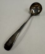 A George III silver cream ladle.