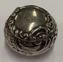 An Art Nouveau silver pill box.