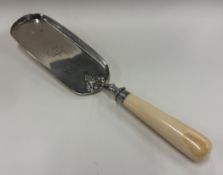 A silver-mounted crumb tray.