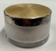 A silver, brown enamelled and glass jewellery box.