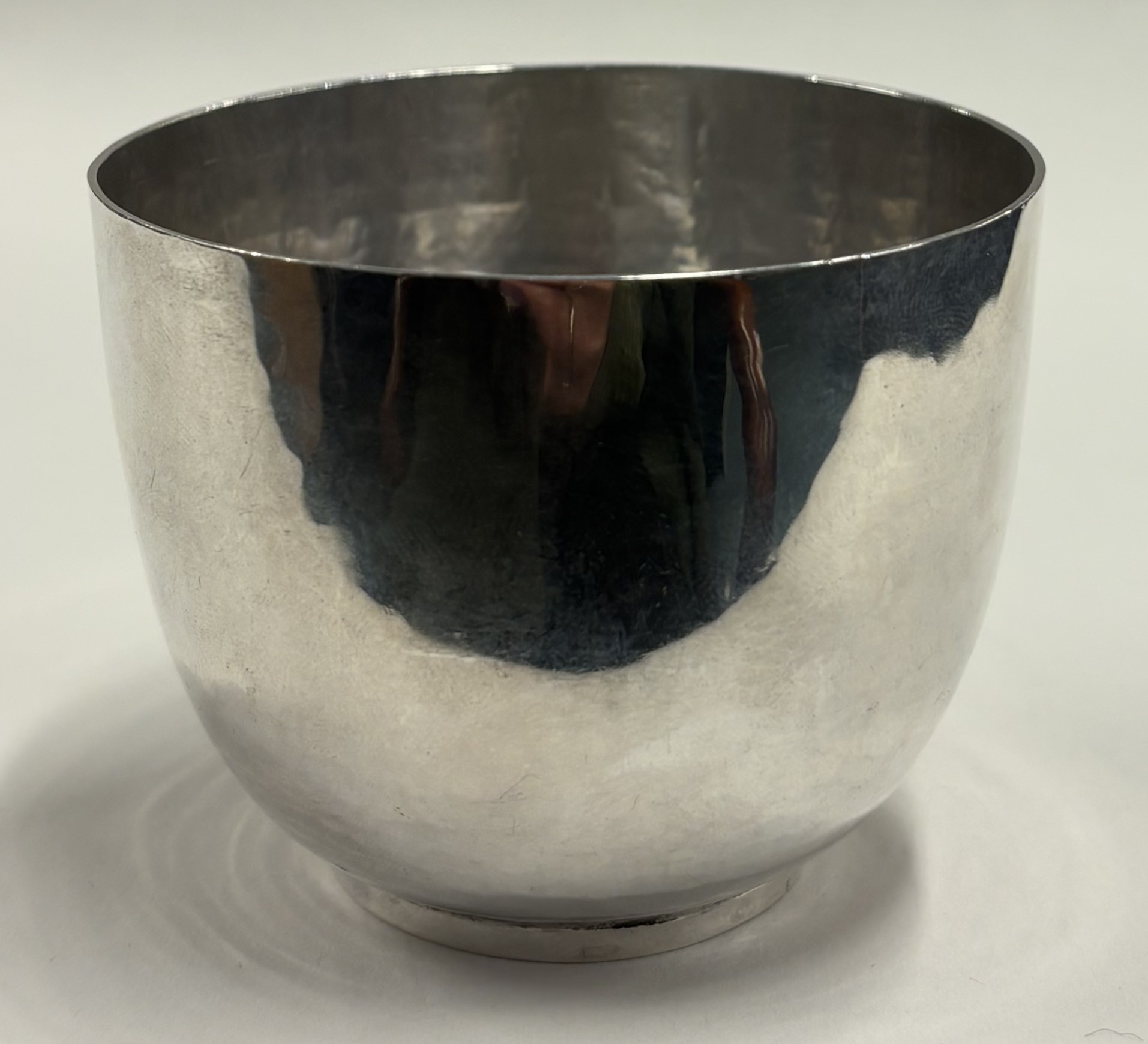 An early 20th Century silver beaker.