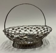 An 18th Century Georgian silver swing-handled basket.