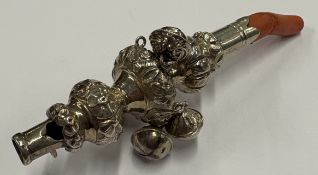 An early 19th Century George III silver rattle.
