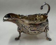 An Edward VII silver sauce boat.