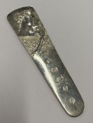A modernistic silver page turner.