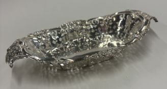 CHESTER: A silver bonbon dish.