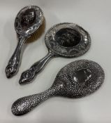 An embossed silver-mounted part vanity set etc.