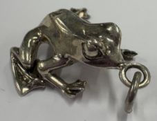 A Sterling silver figure of a frog.