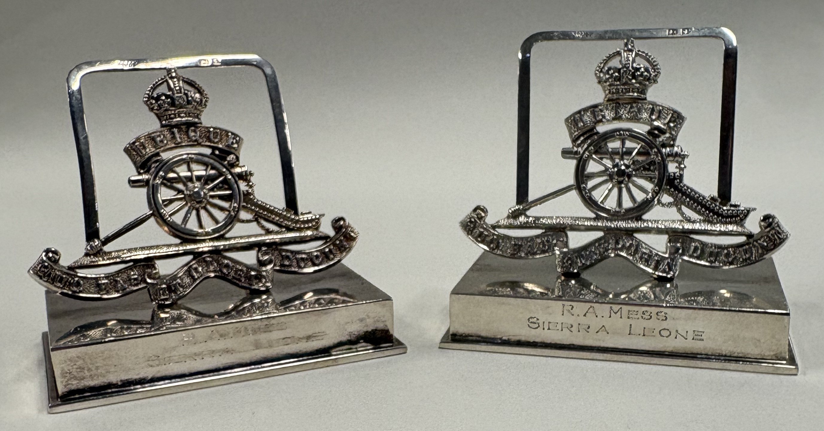 A rare pair of heavy silver regimental menu holders.