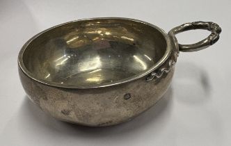 A large 18th Century French silver wine taster.