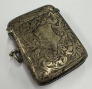 A silver vesta case.