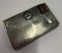 An American silver and enamelled stamp holder.