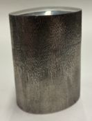 An unusual modernistic silver peppermint box.