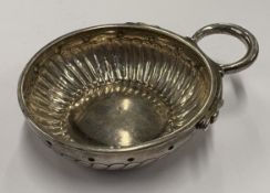 An 18th/19th Century French silver wine taster