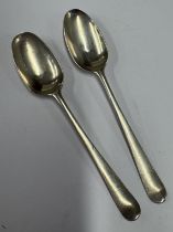 A pair of 18th Century silver picture back spoons.