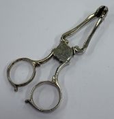 A pair of 18th Century George III silver sugar nips.