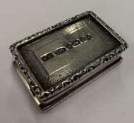 A silver snuff box.