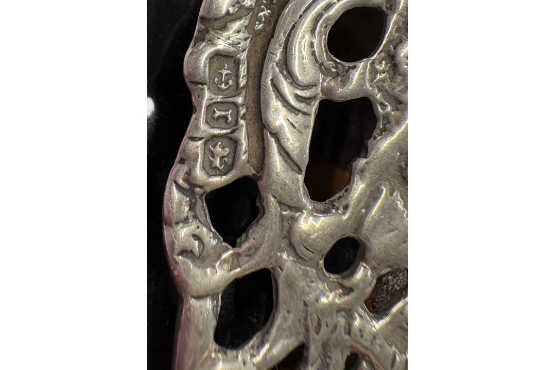 A silver and faux tortoiseshell paper holder. - Image 2 of 2