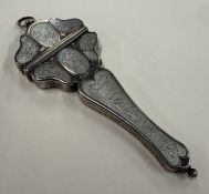 A silver and MOP scissor case.