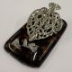 A silver and faux tortoiseshell paper holder. - Image 1 of 2
