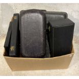 A box containing various cases and boxes.