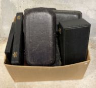 A box containing various cases and boxes.