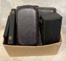 A box containing various cases and boxes.