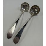 EDINBURGH: A pair of George III Scottish silver toddy ladles.