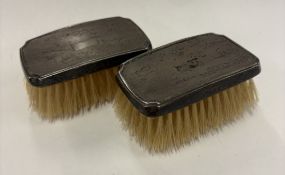 A pair of silver-mounted brushes.