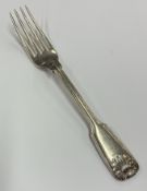 PAUL STORR: A large silver fork.