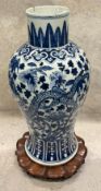 A Chinese Qing dynasty blue and white vase.