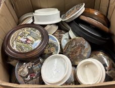 A good collection of pot lids.