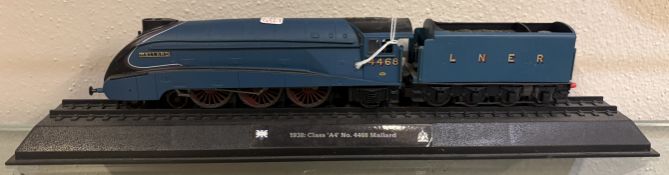 An 00 gauge model locomotive Mallard with tender.
