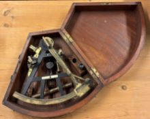 A 19th Century brass sextant.