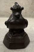 A Burmese bronze opium weight.