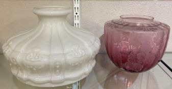 A cranberry glass oil lamp shade etc.