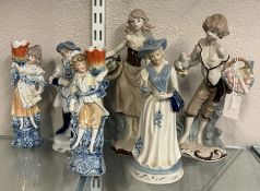 A pair of porcelain Continental figures etc.